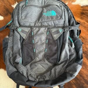 The North Face Charcoal Backpack with Teal Accents